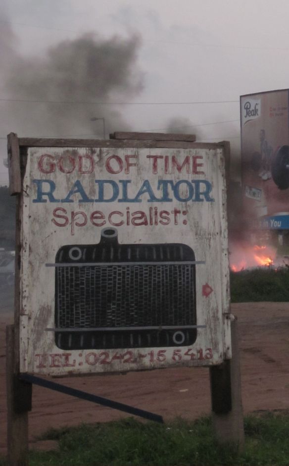 Sign for a radiator repair shop named "God of Time"
