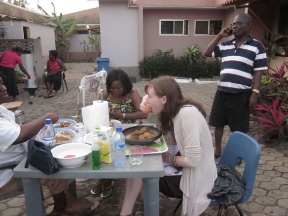 A group of us eating fufu and stew